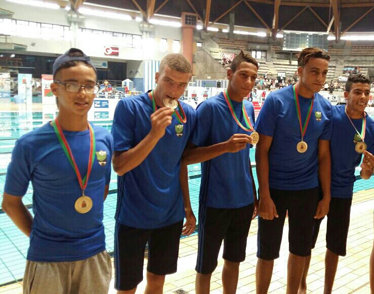 بالصور.. نادي ام الربيع للسباحة بازمور يتوج بالبطولة الوطنية وكأس العرش للغطس