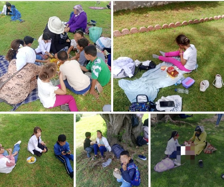 معاناة يومية ومشاهد مؤثرة لأمهات الحوزية يقضين أيام الأسبوع بحدائق الجديدة لإطعام أبنائهم الذين حرموا من النقل المدرسي